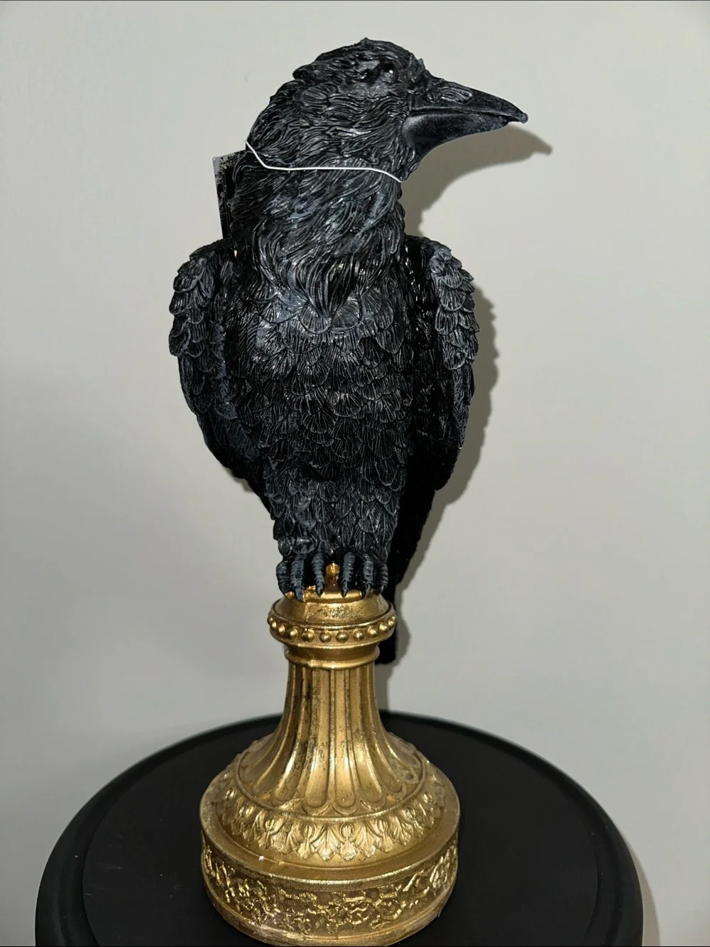 Black Decorative Raven Statue on Gold Pedestal - crow